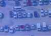 Impound lot management stories and insights feature image with multi-color vehicles on impound lot
