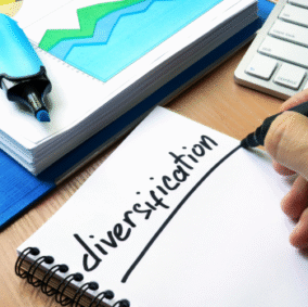 How smart towing business owners diversify revenue: hand writing the word "diversification" on a notepad