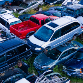 Impound yard image with multi-colored cars ready for sale on Autura Marketplace